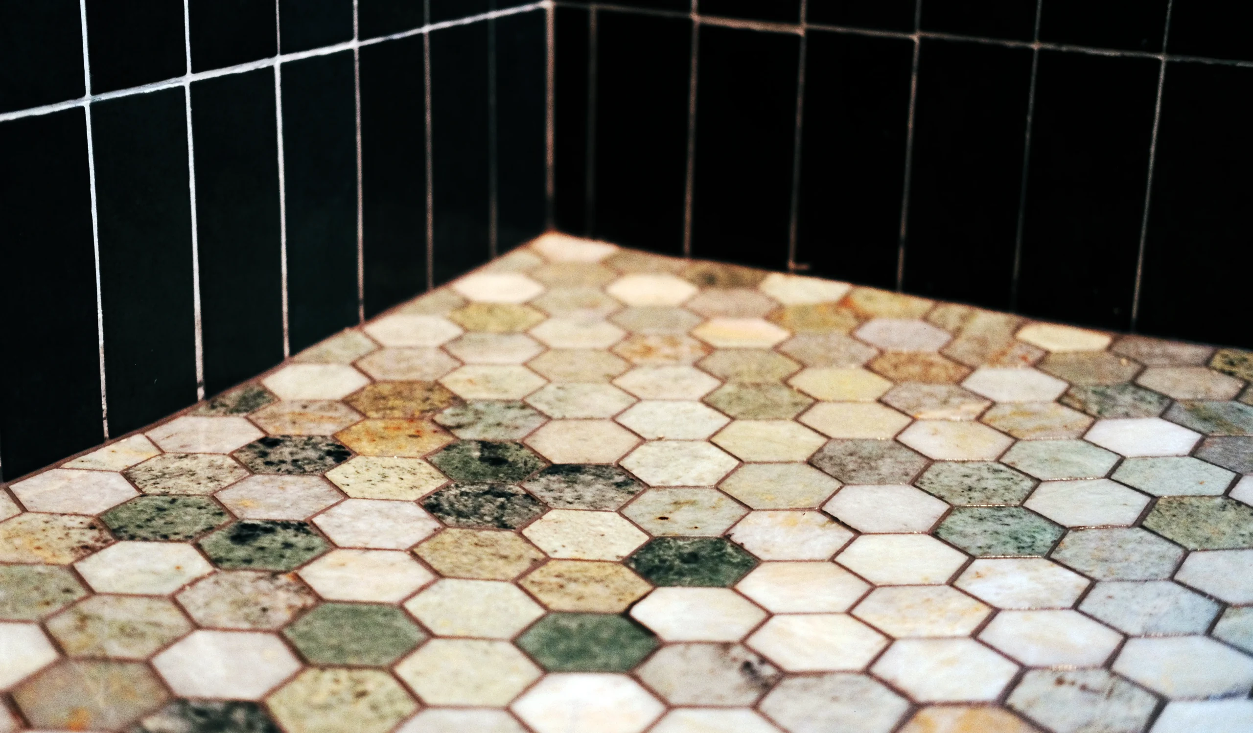 Hexagon wood-look tile flooring installed in an El Paso, TX home