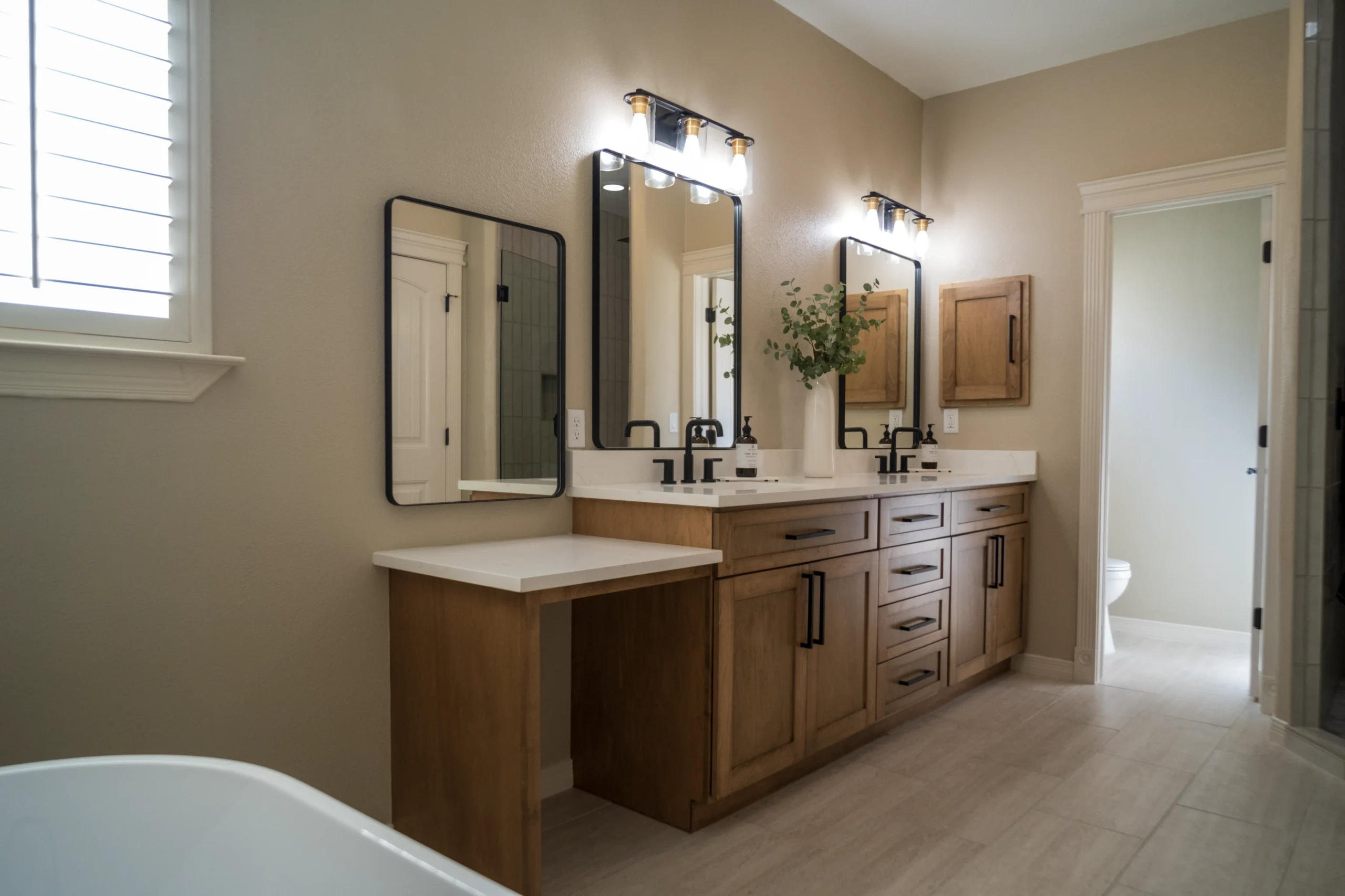 Bathroom double vanity with tile flooring installed in an El Paso, TX home