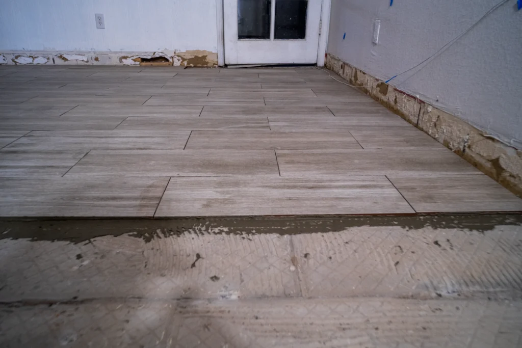 Wide-plank flooring installed through an open room in an El Paso, TX home