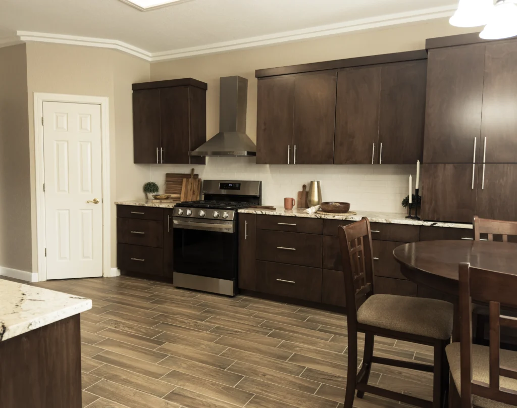 Wood-look plank tile running through an El Paso kitchen with dark cabinets